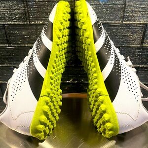 Adidas Boy’s White and Black Turf Shoes with Neon Soles